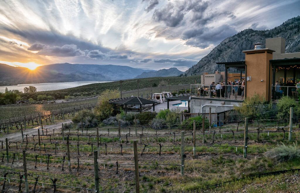 Sunset from the patio of The Bear, The Fish, The Root & The Berry at Spirit Ridge Resort, Osoyoos, BC. | David McIlvride/BC Tourism